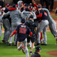 The 2019 Washington Nationals storm the mound following their World Series win.